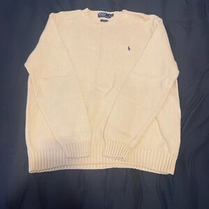 Polo sweater by Ralph Lauren.